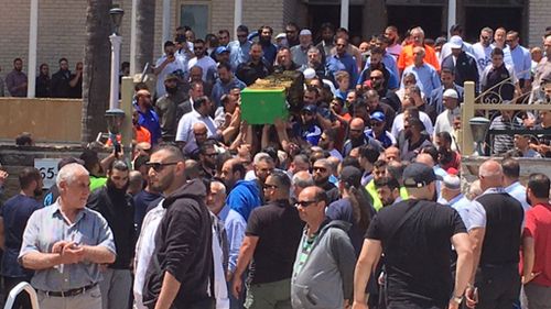 Hundreds of mourners followed the funeral procession into the mosque (Image: 9News/Damian Ryan)