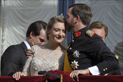 LUXEMBOURG - OCTOBER 20, 2012: Prince Guillaume Of Luxembourg (R) and  Princess Stephanie of Luxembourg kiss on the balcony of the Grand-Ducal Palace after the wedding ceremony of Prince Guillaume Of Luxembourg and Stephanie de Lannoy at the Cathedral of our Lady of Luxembourg on October 20, 2012 in Luxembourg. The 30-year-old hereditary Grand Duke of Luxembourg is the last hereditary Prince in Europe to get married, marrying his 28-year old Belgian Countess bride in a lavish 2-day ceremony. (Pi