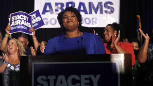 Stacey Abrams writes romance thrillers under a pseudonym. But she's on the verge of an upset in the Deep South state of Georgia.