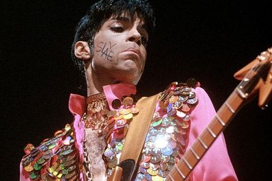 Prince performing on stage.