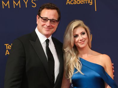 Bob Saget and Kelly Rizzo attend the 2018 Creative Arts Emmy Awards at Microsoft Theater on September 8, 2018 in Los Angeles, California. 