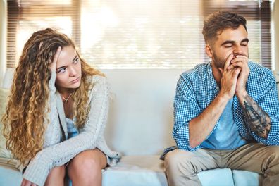 Shot of a young couple having a disagreement at home