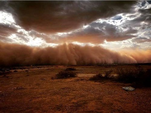 The dust storm envelopes Milparinka, a small outback town.