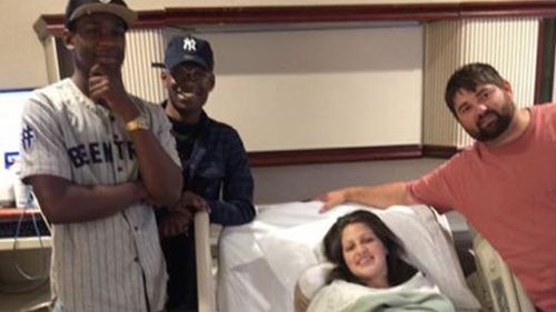 An excited grandmother accidently texted complete strangers after her daughter-in-law gave birth – and they showed up with gifts