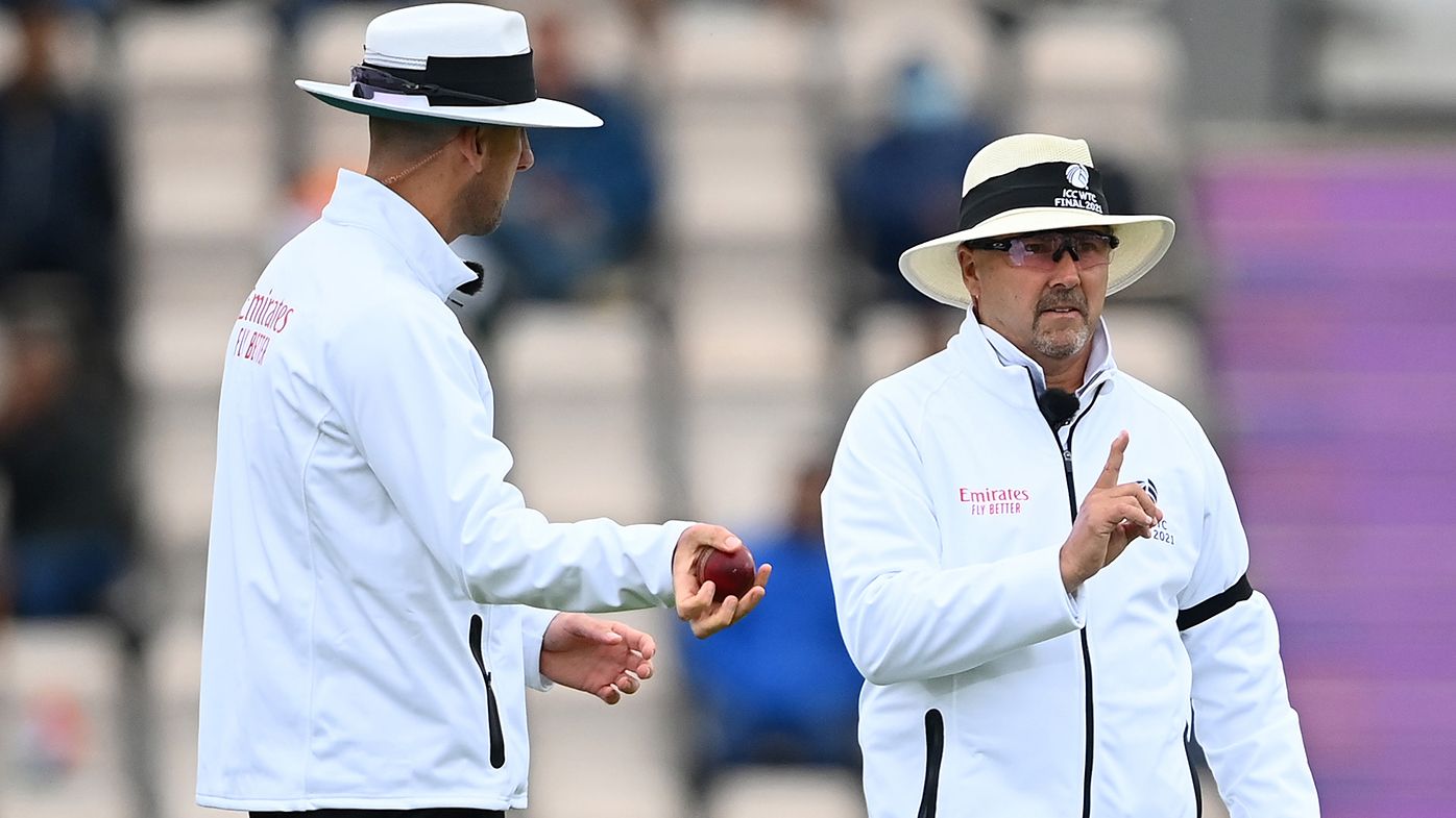 Umpire Richard Illingworth shows the soft signal as out for the wicket of Virat Kohli of india which is later overturned alongside Michael Gough during Day 2 of the ICC World Test Championship Final between India and New Zealand at The Hampshire Bowl on June 19, 2021 in Southampton, England. (Photo by Alex Davidson/Getty Images)