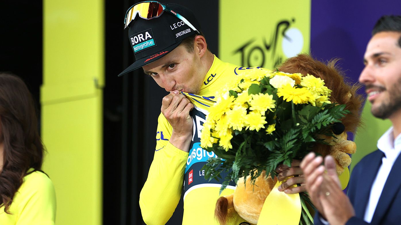  Jai Hindley of Australia and Team BORA-Hansgrohe kisses the Yellow leader jersey at podium during the stage five of the 110th Tour de France 2023 a 162.7km stage from Pau to Laruns / #UCIWT / on July 05, 2023 in Laruns, France. (Photo by Michael Steele/Getty Images)