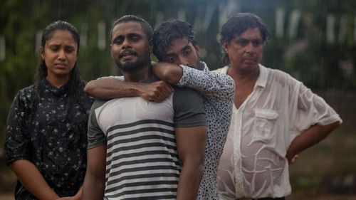 Mourners grieve at the burial of three members of the same family victims of Easter Sunday bomb blast at St. Sebastian Church in Negombo.