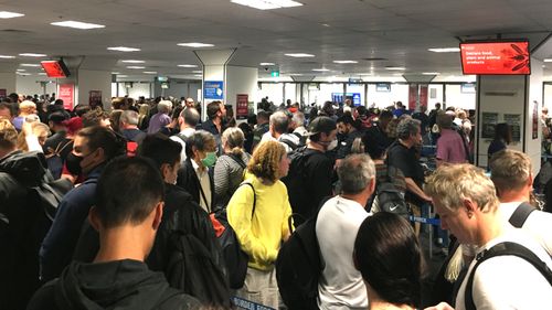Sydney's airport is jammed with frustrated passengers who landed hours after Australia's tough new coronavirus travel measures were rolled out.