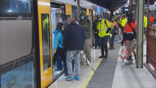 Sydney's Central Station saw commuters return, with services almost back to normal. Face masks are mandatory on board and at stations.