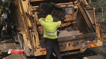 Crews roll in to clean mountain of rubbish from public housing estate
