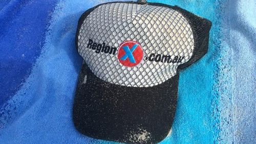 The missing man's cap was found this morning after a witness saw him enter the water. (Picture: Supplied)