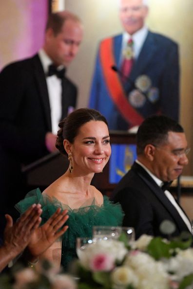 Catherine Duchess of Cambridge and Prime Minister of Jamaica Andrew Holness (R) listen as Prince William, Duke of Cambridge speaks during a dinner hosted by the Governor General of Jamaica at King's House on March 23, 2022 in Kingston, Jamaica. The Duke and Duchess of Cambridge are visiting Belize, Jamaica and The Bahamas on behalf of Her Majesty The Queen on the occasion of the Platinum Jubilee. The 8 day tour takes place between Saturday 19th March and Satu