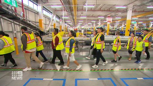 The Amazon fulfilment centre at Kemps Creek is run by artificial intelligence and machine learning robots, and they are officially opening their doors for free tours of the floor-to-ceiling facility.