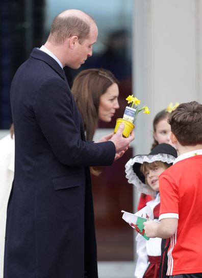 Prince William, Prince of Wales speaks to young well-wishers as he departs Aberavon Leisure & Fitness Centre with Catherine, Princess of Wales during their visit to Wales on February 28, 2023 in Port Talbot, Wales