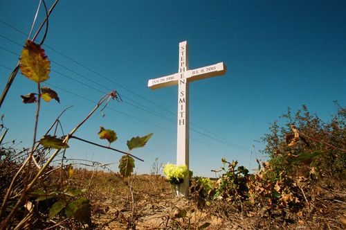 A wooden roadside cross marks the spot where Stephen Smith's body was found on Sandy Run Road in rural Hampton County, South Carolina.