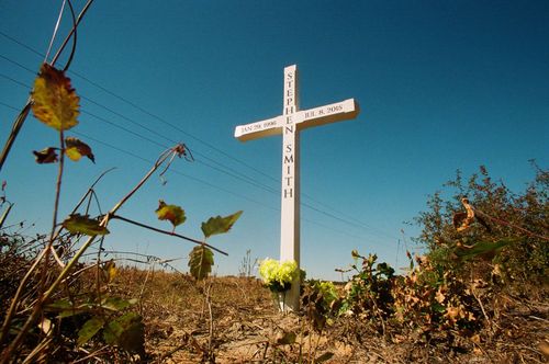 A roadside wooden cross marks the spot where Stephen Smith's body was found on Sandy Run Road in rural Hampton County, S.C.