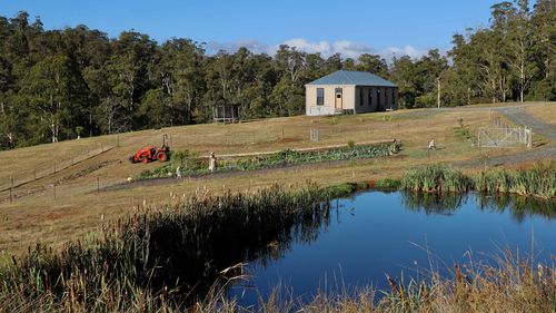 This home is open plan with high ceilings and large windows, making the most of the northern Tasmanian countryside.