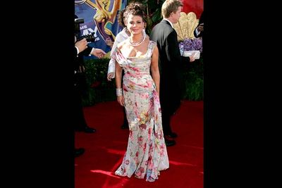 <b>Where she wore it:</b> The 58th Annual Primetime Emmy Awards, 2006.<br/><br/><b>The look:</b> "Crap!" thought Paula. "The Emmys are <i>tonight</i> and I haven't got a dress yet! Maybe I could whip something up out of these floral-print curtains in my grandma's house...?"