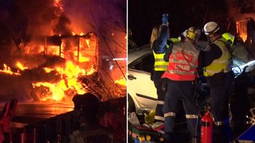 A driver is fighting for his life after he became trapped in his car following a fiery collision with a semi-trailer in the Blue Mountains.