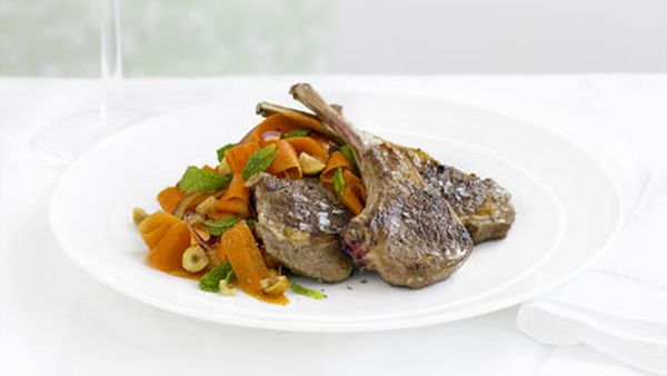 Lamb cutlets with spiced carrot and hazelnut salad