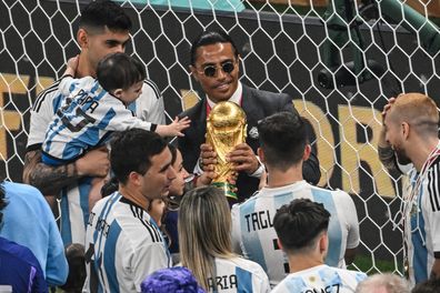 Nusret Goekce, Salt Bae, admires the FIFA World Cup Qatar 2022 Winner's Trophy after the final between Argentina and France at Lusail Stadium, Qatar, December 18, 2022. 