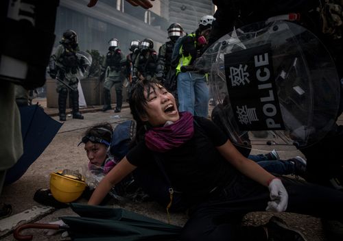 A pro-democracy protester screams out as she is tackled and arrested by police during clashes after a march on September 29, 2019 in Hong Kong, China. Pro-democracy demonstrations have entered its fourth month as Hong Kong braces for the 70th anniversary of the founding of the People's Republic of China with a series of pro and anti-Beijing protests scheduled towards October 1.