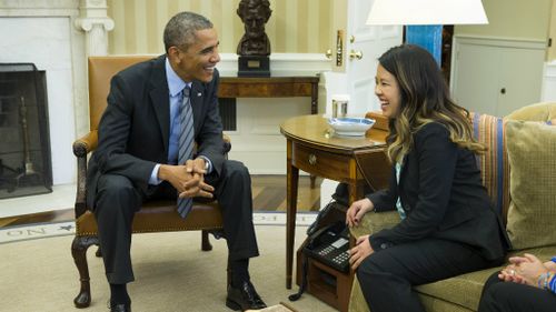 US President Barack Obama meets with cured Ebola nurse Nina Pham. (AAP)