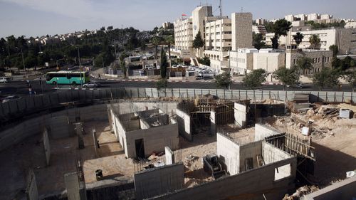 This 2016 photo shows construction on land owned by Palestinian Mohammad Abu Taâ discovered some years ago that the Israeli government had expropriated the piece of land in Jerusalem belonging to his family.(Photo: AAP)