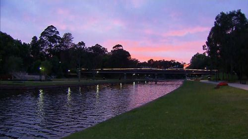 Sunrise over Parramatta, where temperatures are expected to exceed 40 degrees today.