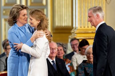 King Philippe of Belgium, Queen Mathilde and Princess Elisabeth during the 18th birthday celebration.