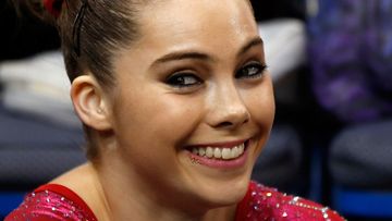 McKayla Maroney smiles after competing on the floor exercise during the US women's national gymnastics championships in 2013. (AAP)