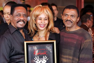 HOLLYWOOD, CA - APRIL 4: Musician Ike Turner with guest Audrey Madison and Ike Turner Jr. pose after Ike was Inducted into the Hollywood Rockwalk along with Muddy Waters, Robert Cray, Solomon Burke and Etta James on April 4, 2005 in Hollywood, California. (Photo by Frazer Harrison/Getty Images)  *** Local Caption *** Ike Turner;Audrey Madison;Ike Turner Jr