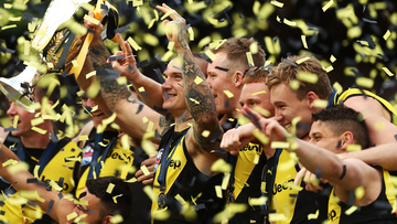 *APAC Sports Pictures of the Week - 2019, September 30* MELBOURNE, AUSTRALIA - SEPTEMBER 28: Dustin Martin of the Tigers holds aloft the Premiership Trophy after victory in the 2019 AFL Grand Final match between the Richmond Tigers and the Greater Western Sydney Giants at Melbourne Cricket Ground on September 28, 2019 in Melbourne, Australia. (Photo by Mark Metcalfe/AFL Photos/via Getty Images )