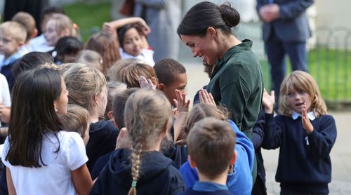 Meghan has impressed onlookers with her affectionate nature when meeting children on royal walkabouts.