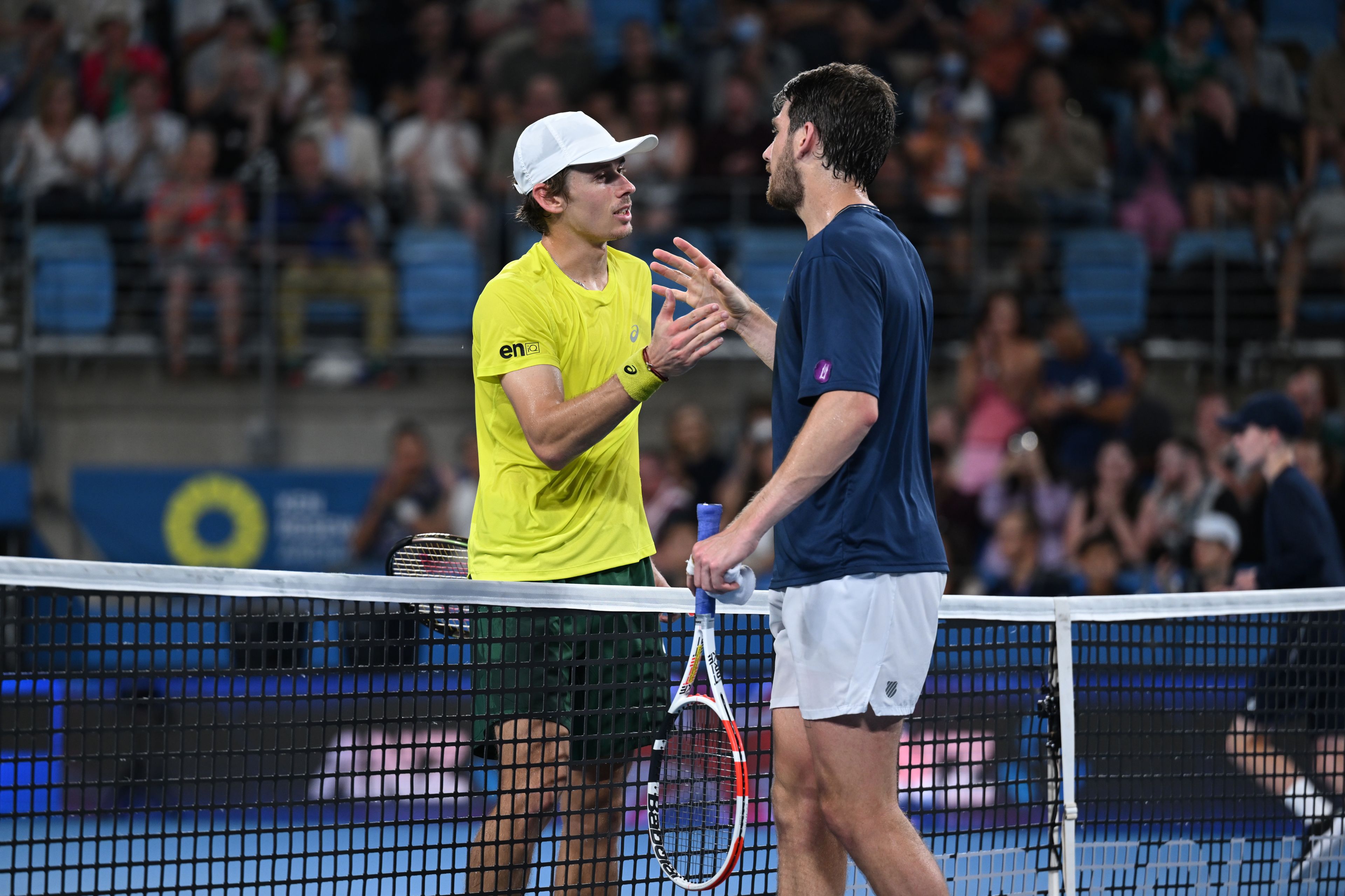 Alex De Minaur of Team Australia shakes hands with Cameron Norrie of Team Great Britain on Ken Rosewall Arena during their Group C match on Day 1 of the 2023 United Cup in Sydney on Thursday, December 29, 2022. MANDATORY PHOTO CREDIT Tennis Australia/ ATP, PETER STAPLES