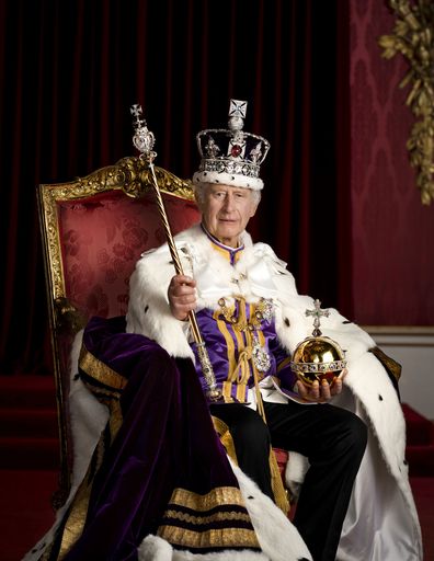 King Charles III poses for a photo in full regalia in the Throne Room, London. The King is wearing the Robe of Estate, the Imperial State Crown and is holding the Sovereign's Orb and Sovereign's Sceptre with Cross. He is seated on one of a pair of 1902 throne chairs that were made for the future King George V and Queen Mary for use at the Coronation of King Edward VII.