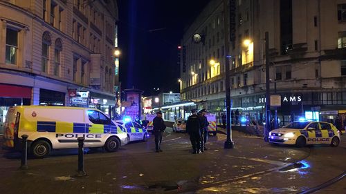 Two people have been injured after a stabbing attack outside a busy department store in the UK overnight.