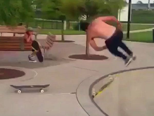Skater switches board with epic front flip