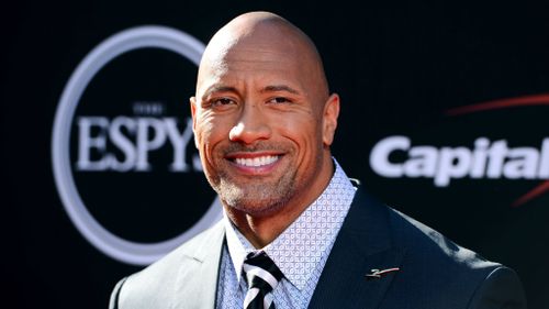 Former wrestler Dwayne Johnson is second on the Forbes Hollywood Rich List. (AAP)