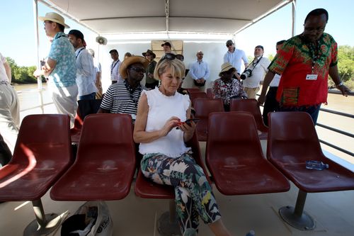 Ms Bishop catches up with some work on board the tourist boat the Adelaide River Queen II on the Adelaide river, east of Darwin. Picture: AAP