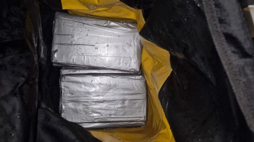 The Australian Federal Police (AFP) said three men were arrested on Sunday at a regional boat ramp after allegedly collecting 500kg of cocaine from a larger cargo vessel at sea.