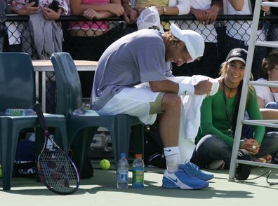 Lleyton Hewitt and Bec Hewitt (then dating) during practice at the Medibank International at Olympic Park at the Australian Open 2005.