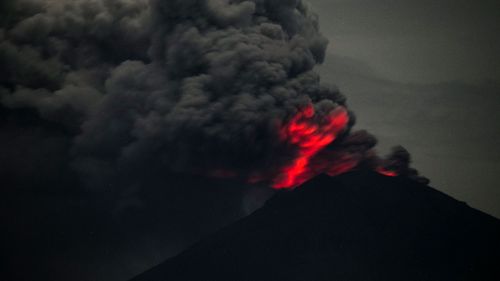 Mount Agung volcano spewing hot volcanic ash seen from Amed in Karangasem, Bali. (Image: AAP)