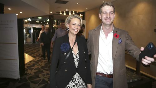 Candidate for the Federal Seat of Warringah, Katherine Deves is escorted by advisor James Flynn at the Forrestville RSL Club in Sydney's North Shore.