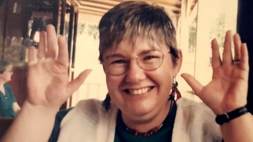 Susan Fisher, 64, from Macquarie Fields in the city's south-west, died in Liverpool Hospital after catching the virus from a nurse.