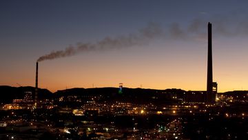 Mt Isa lead poisoning story. The copper smelter stack and lead smelter stack at the Xtrata Mount Isa Mines site in western Queensland at dusk. Thursday 2nd July 2009.