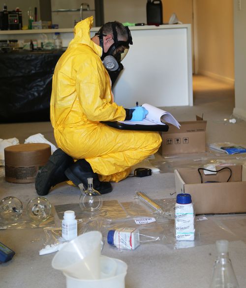 A mix of chemicals are typically used as part of the process of mixing drugs, requiring officers to take extreme precautions. (Supplied)