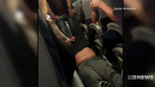 Chicago aviation officer James Long, one of the staff involved in removing a passenger from a plane in Chicago, is also suing the city over the incident last April.