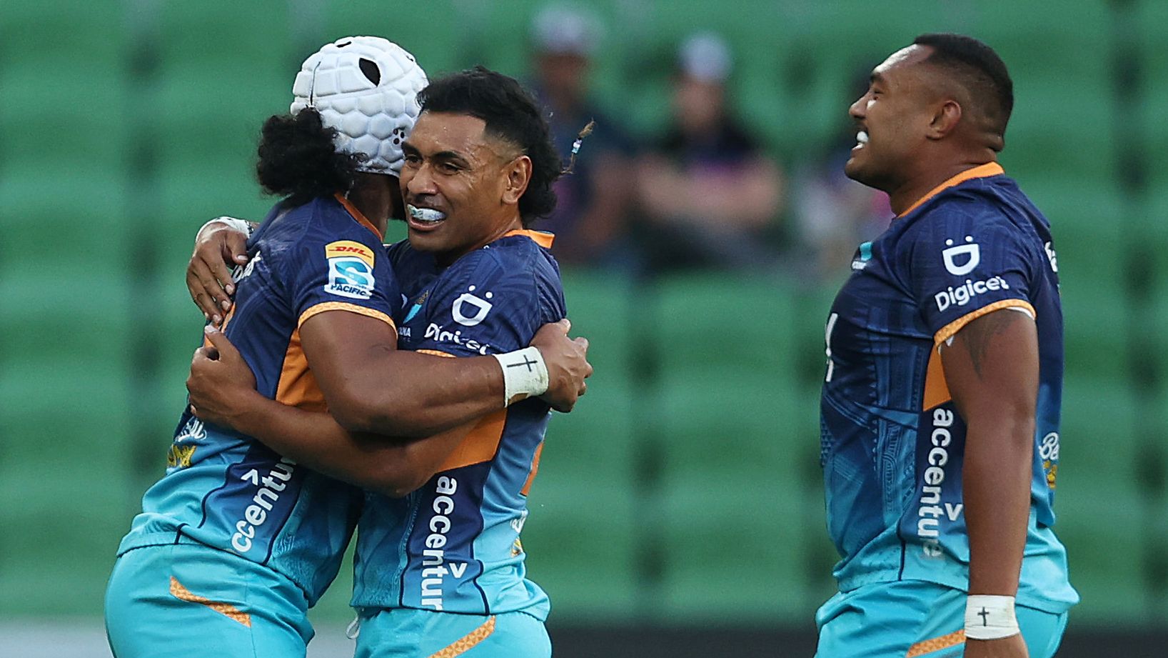 Moana Pasifika players react after winning the round two Super Rugby Pacific match against the Fijian Drua.