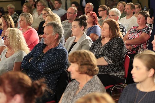 A large number of people at the meeting remain undecided about who to vote for on Saturday. (AAP)